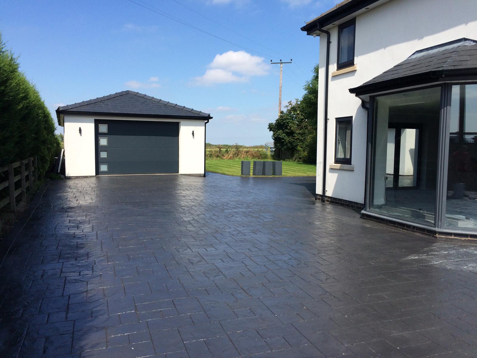 Charcoal imprinted concrete driveway